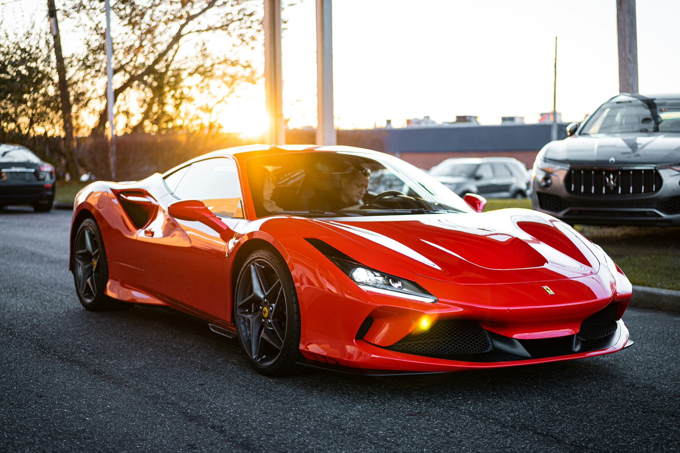 Red Ferrari F8 Tributo at sunset